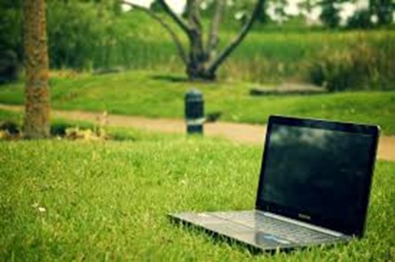 Laptop on the grass in a park