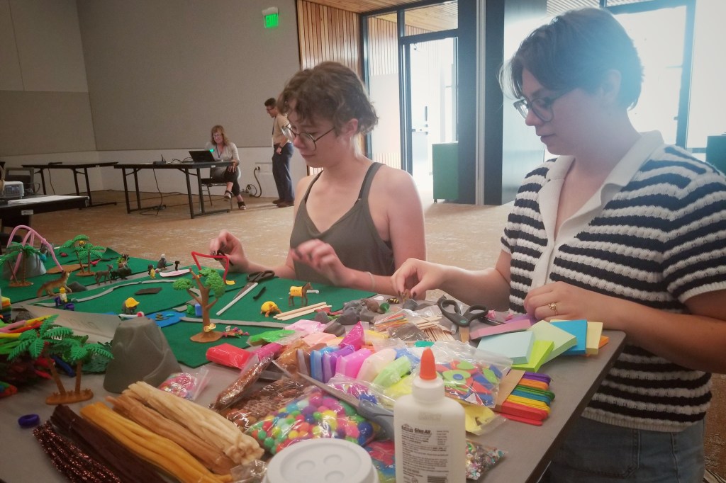 STS students working on building park elements at the Build-A-Park session.